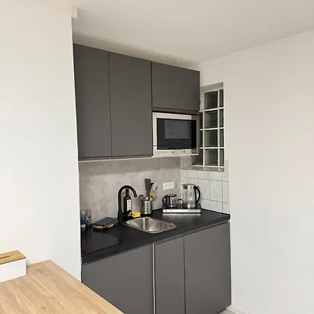 Modernes Nahe Arena & Mercedes Museum Apartman